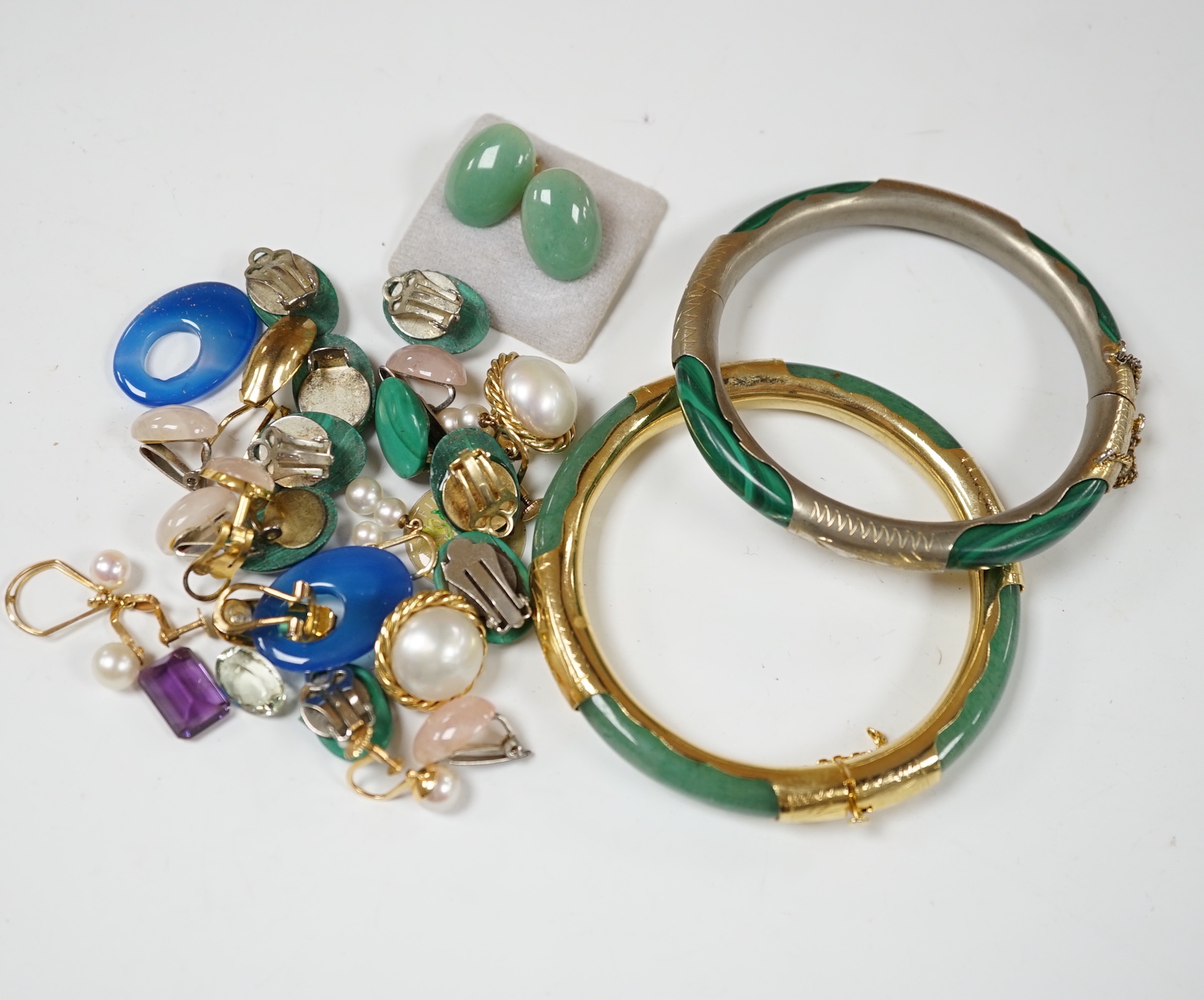 A pair of 14k and three stone cultured pearl set drop ear clips, 23mm, a pair of 18k and single stone cultured pearl set ear clips, a quantity of assorted costume ear clips and two bangles etc.